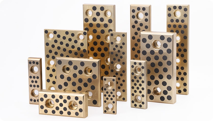 Jaké jsou hlavní výhody použití samomazných ložisek oproti standardním ložiskům s mazáním tukem nebo olejem?